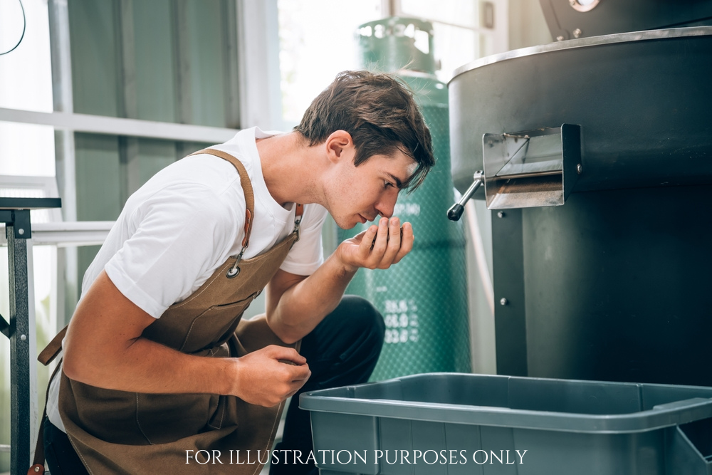 Small Business Owner's Caucasian Male Working in Coffee Beans Warehouse, Quality Coffee Production, Small Business Owner's Expertise in Coffee Roasting